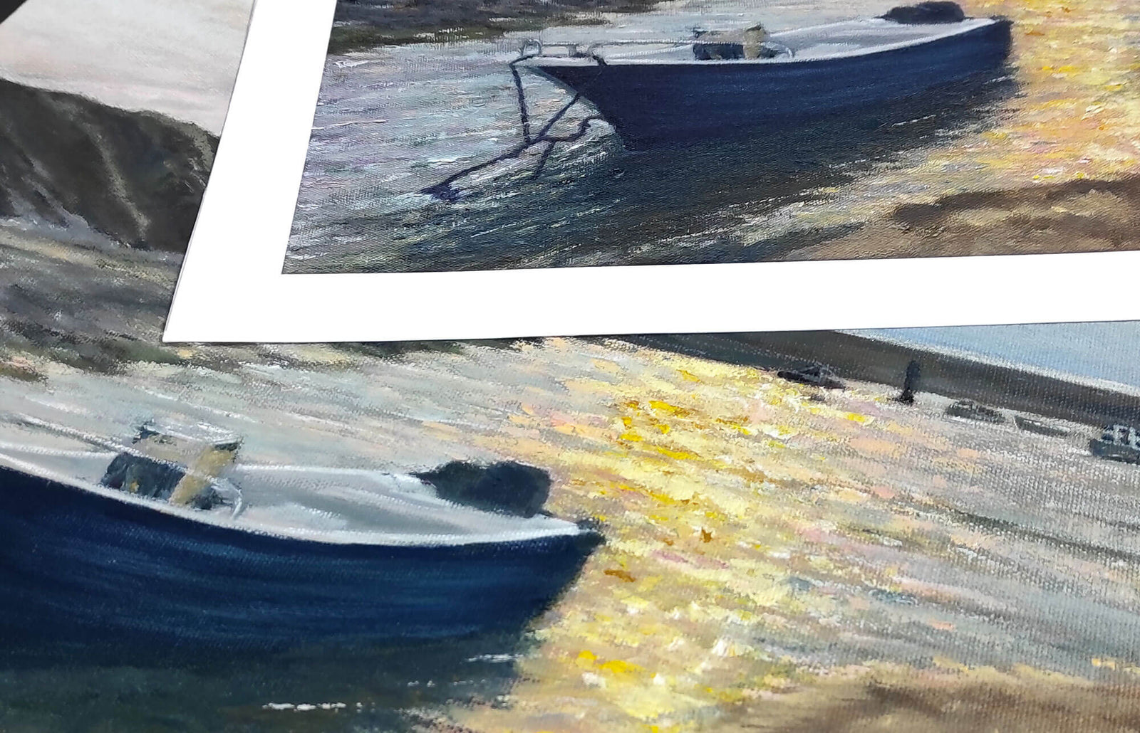 Two paintings of a blue boat on water with a coastal background.